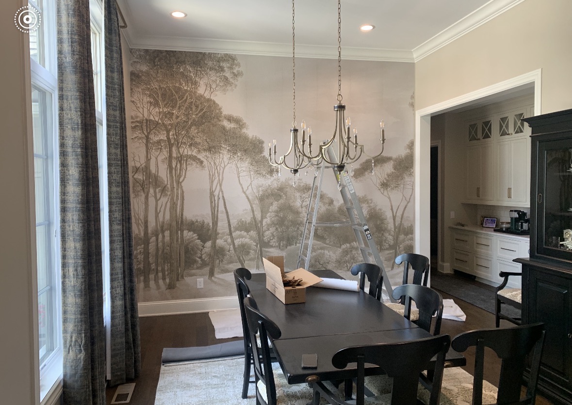 Formal dining room with hand-installed scenic mural