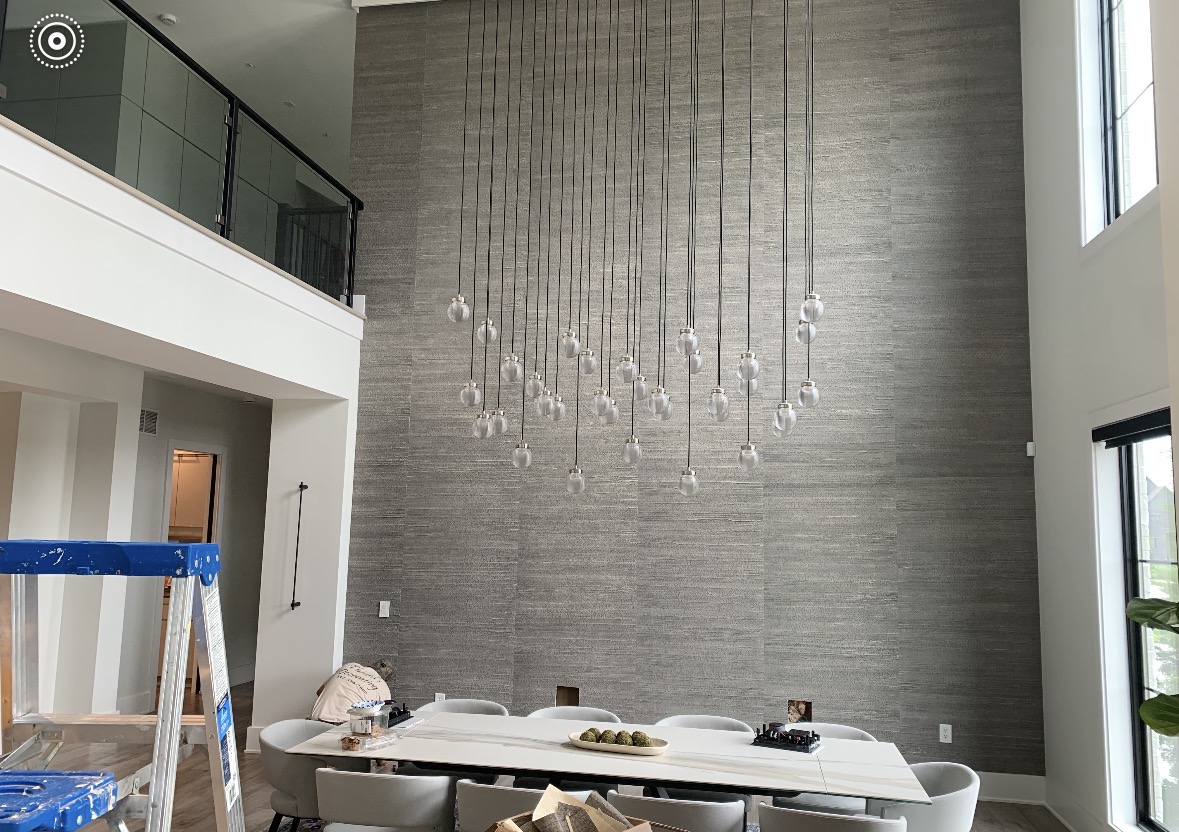 Two-story great room with custom grey accent wall